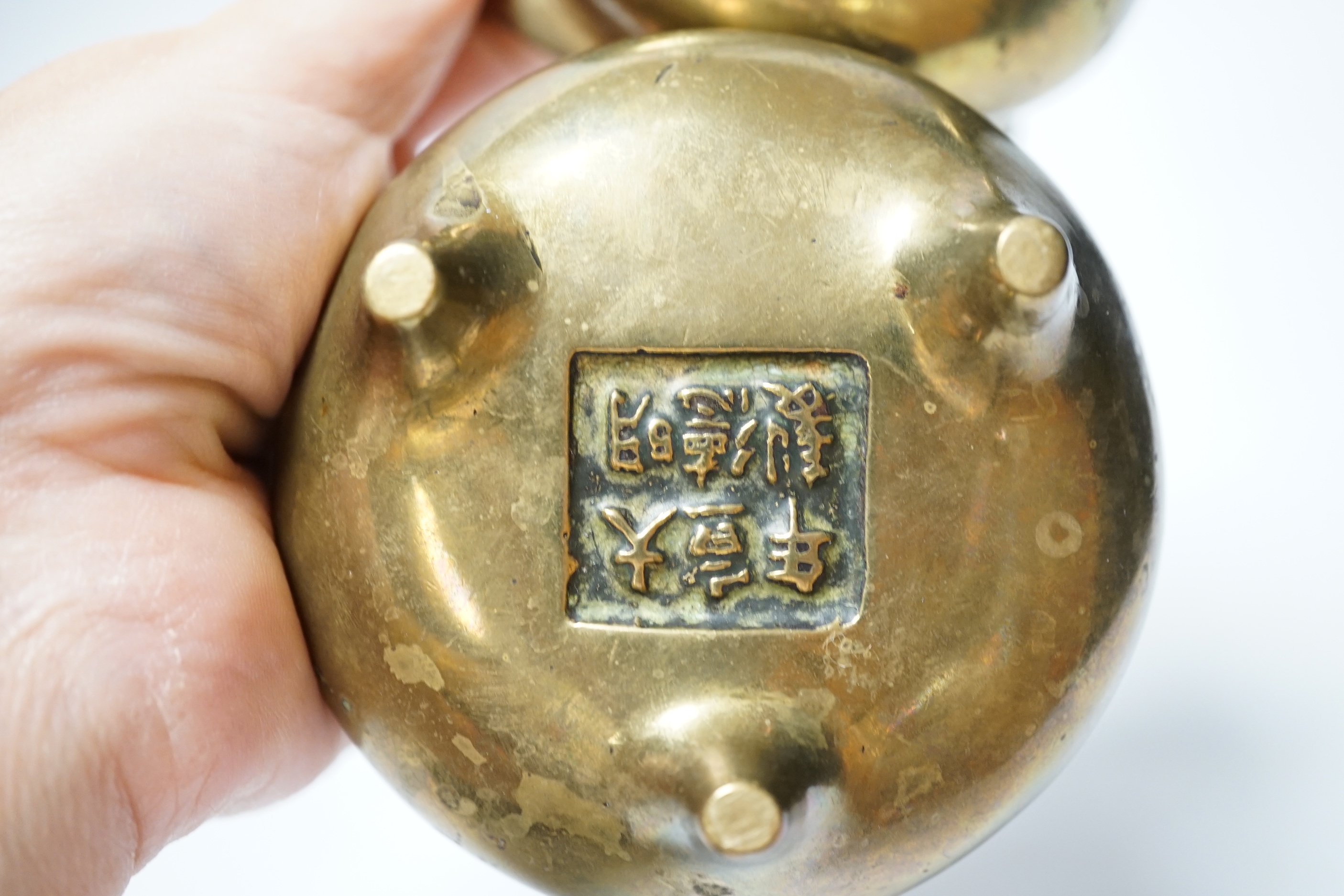 A pair of late 19th/early 20th century Chinese bronze censers, 8.5cm handle to handle